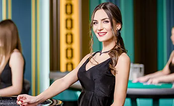 Điện thoại di động hiển thị nút 'Tải Ngay' của vin777